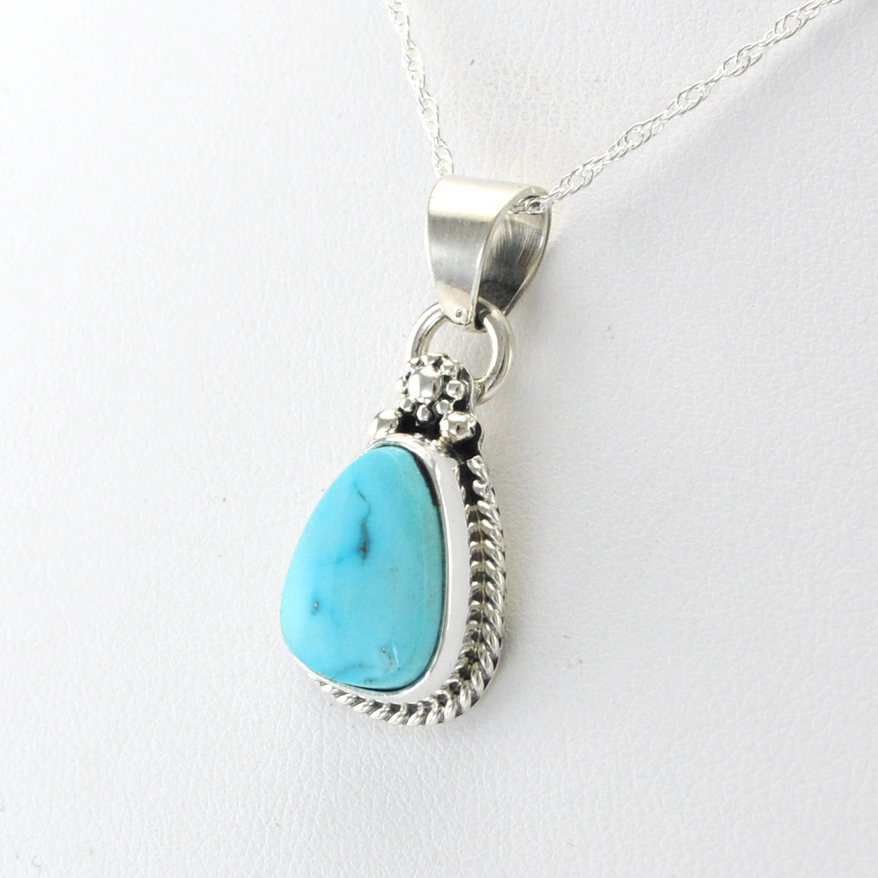 Side View Silver Kingman Turquoise Tear Necklace