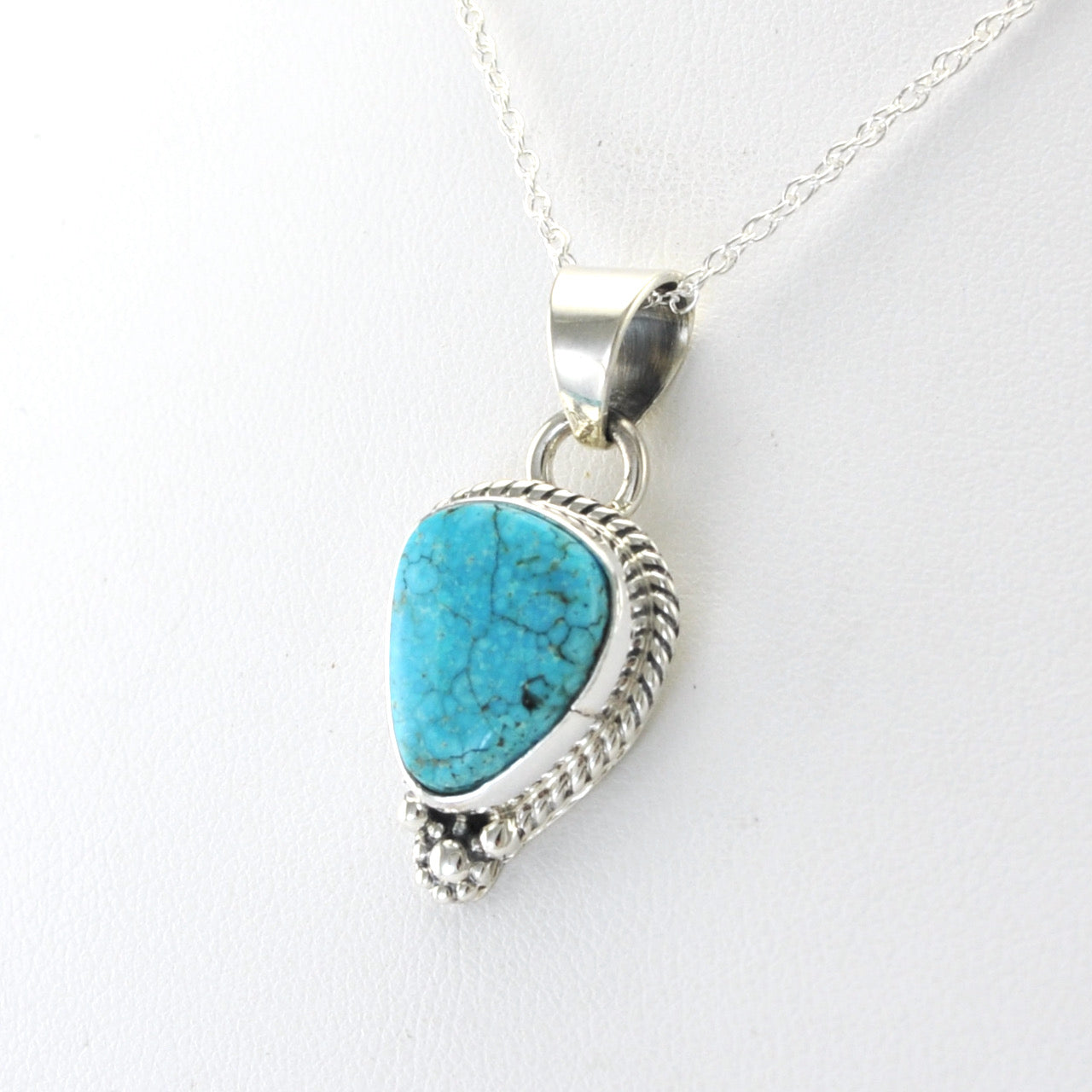 Side View Silver Kingman Turquoise Trillion Necklace