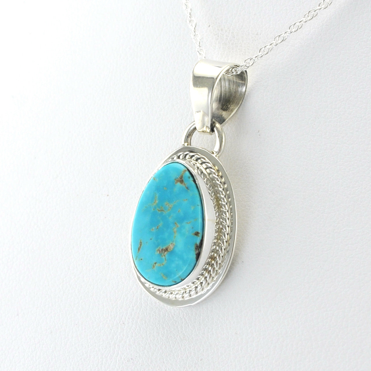 Side View Silver Kingman Turquoise Oval Necklace