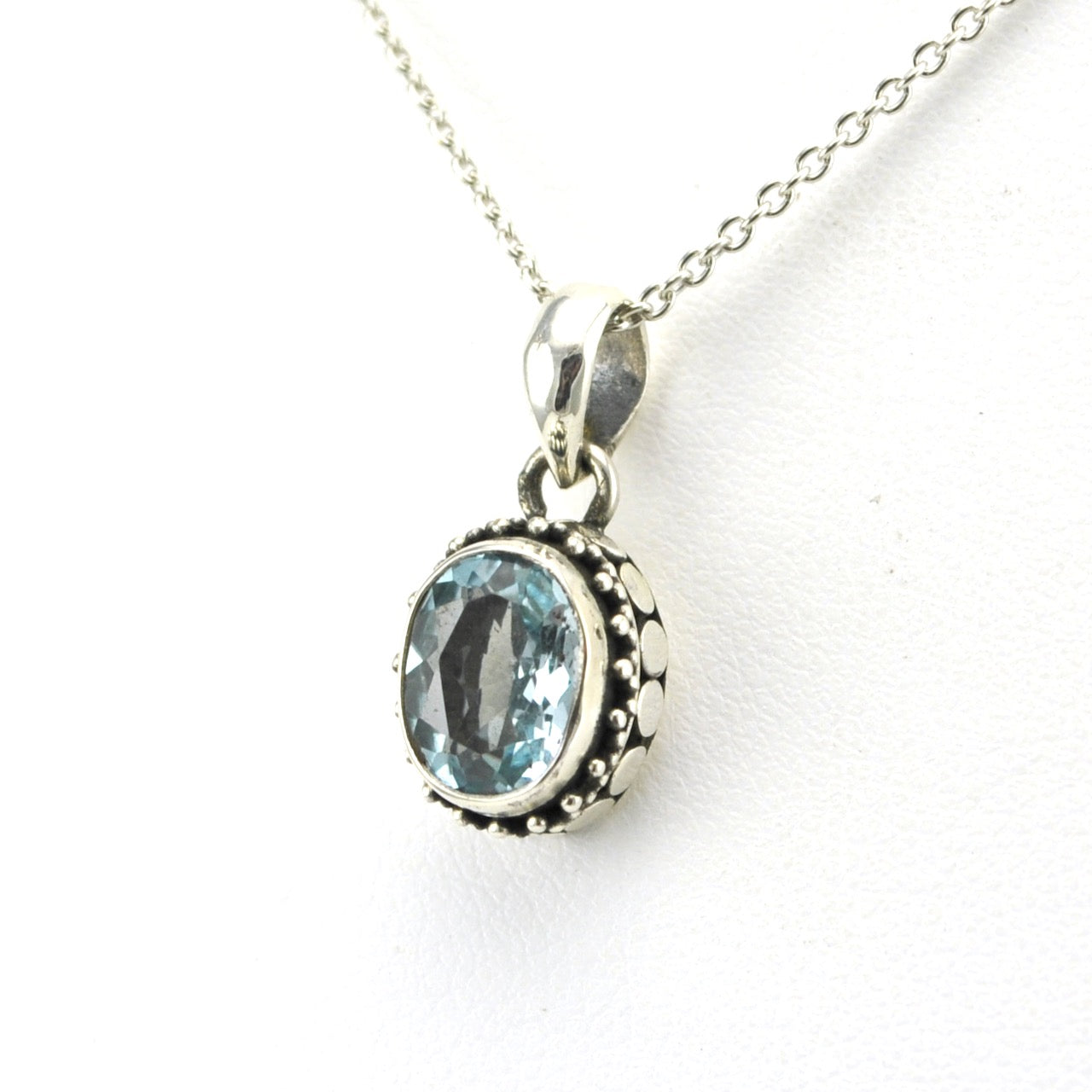 Side View Sterling Silver Blue Topaz Oval Bali Necklace