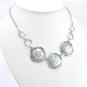 Side View Silver Roman Glass 3 Circle Necklace