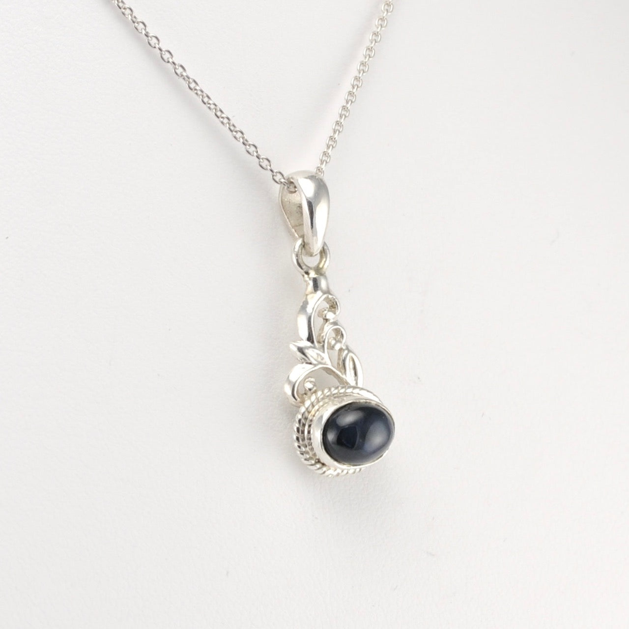 Side View Silver Black Star Diopside Oval Scroll Pendant