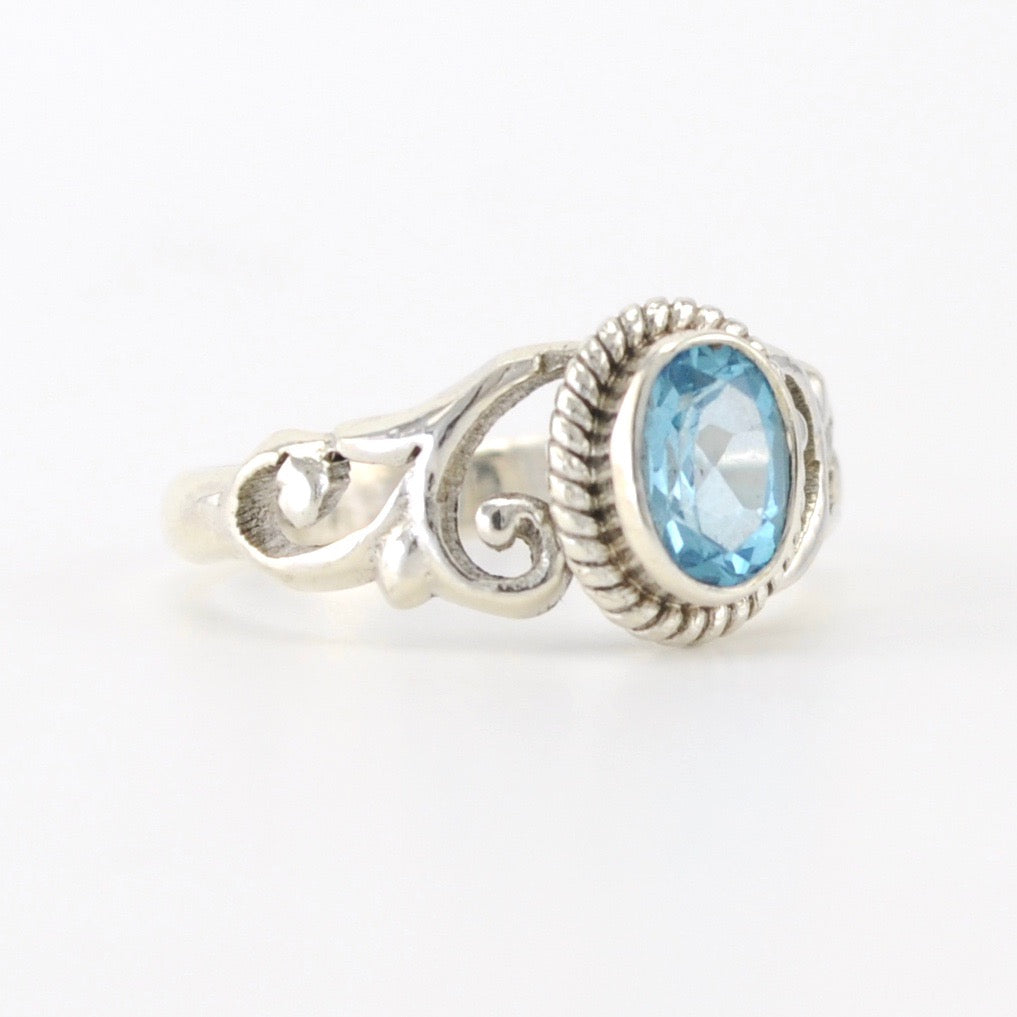 Alt View Silver Blue Topaz 5x7mm Oval Scroll Ring