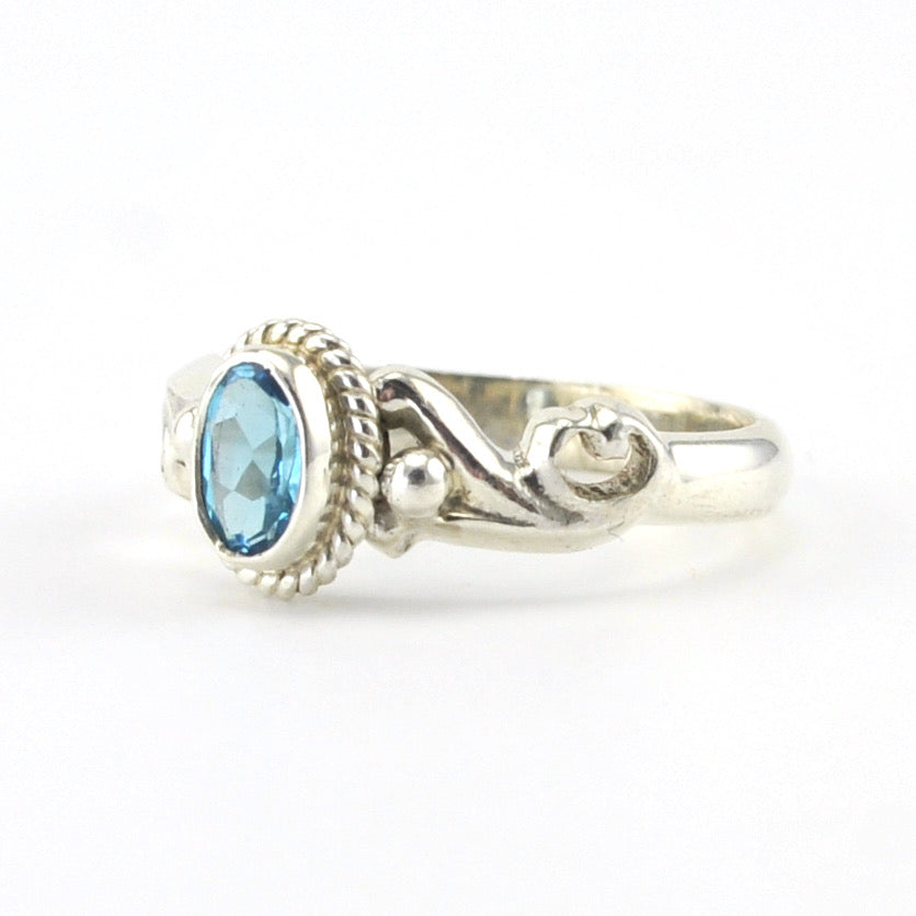 Side View Silver Blue Topaz 4x6mm Oval Ring