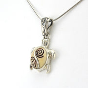 Side View Fossilized Ivory with Sterling Silver Sea Turtle Necklace