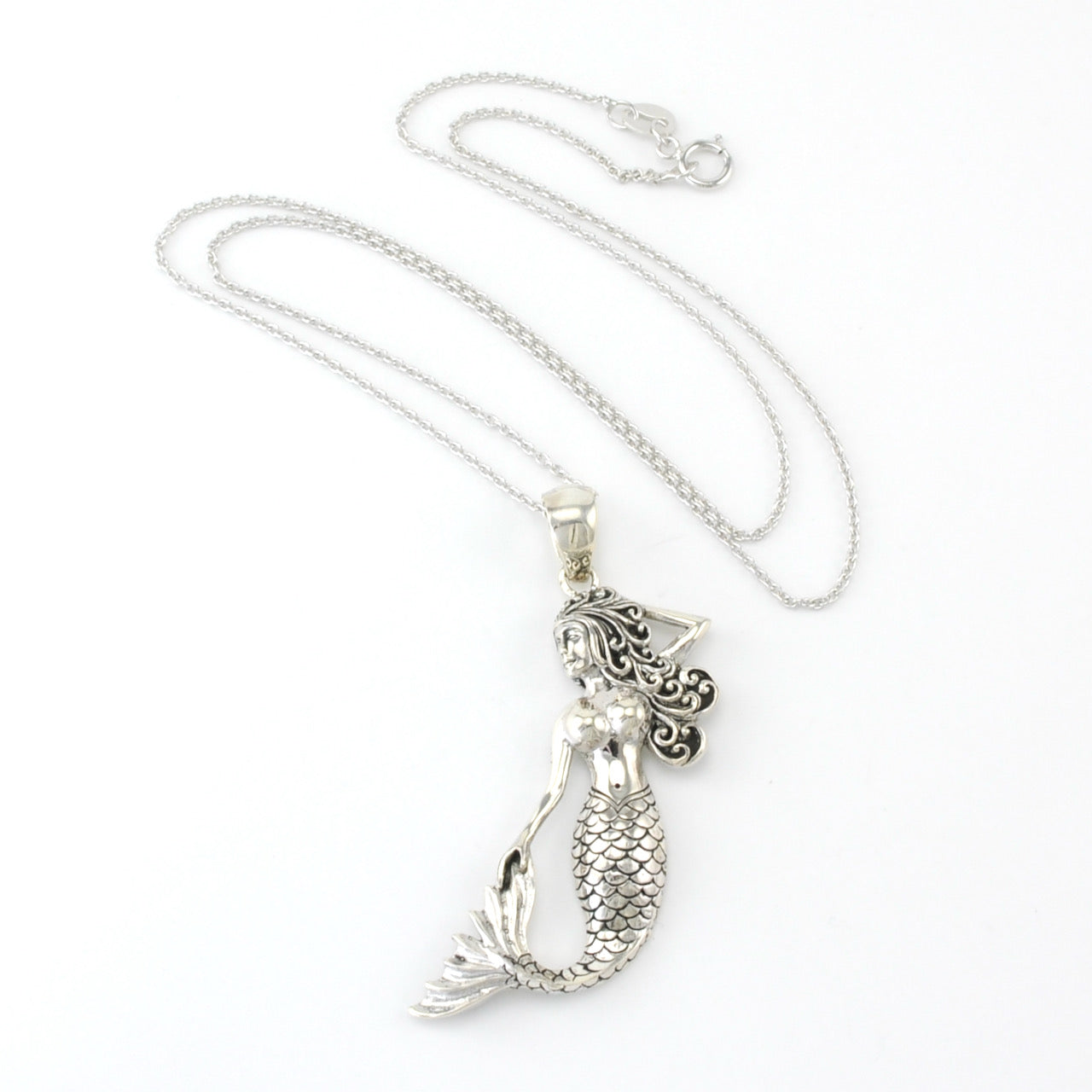 Overhead View Silver Mermaid Tail Out Necklace