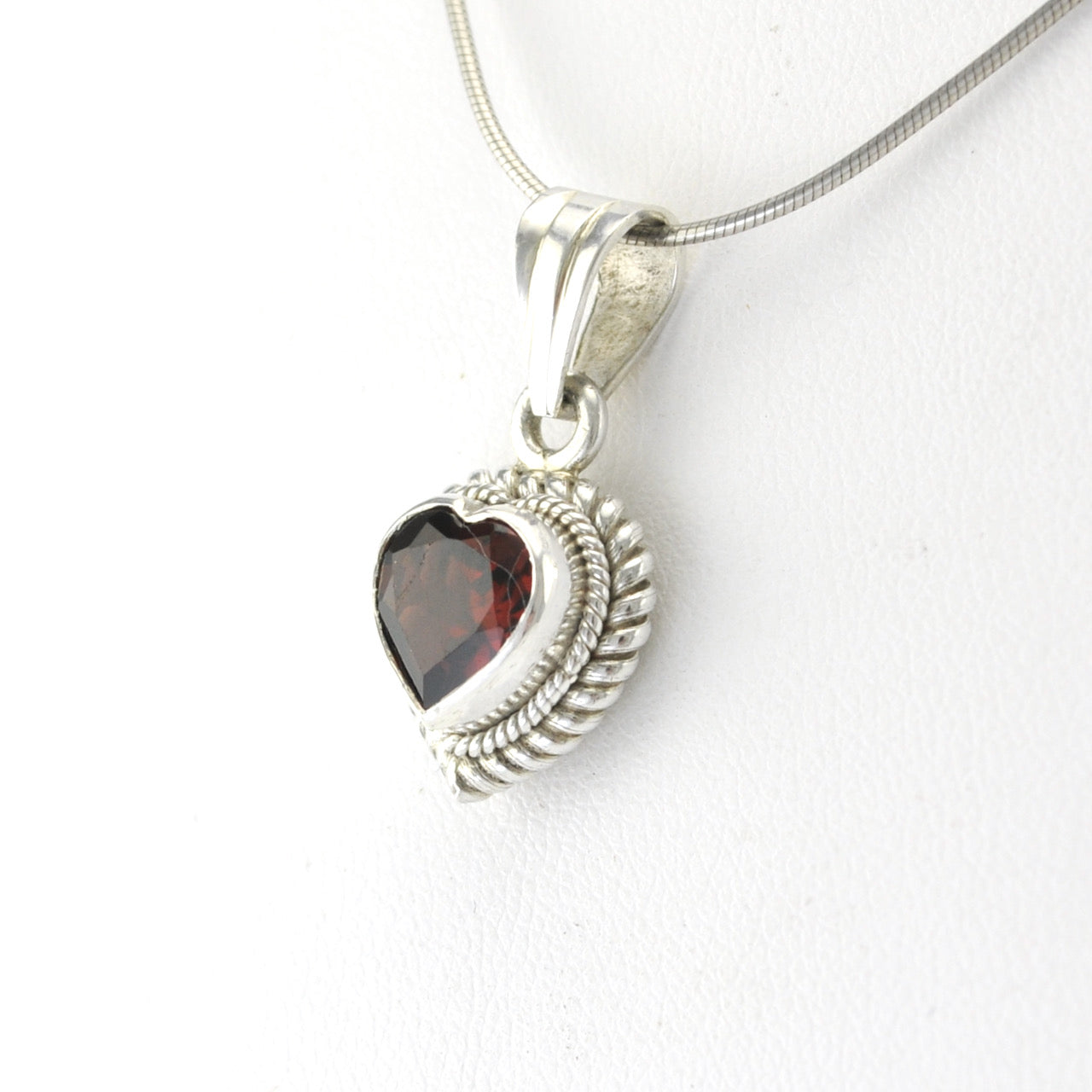 Side View Silver Garnet Heart Pendant